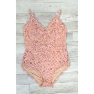 Pink lace bodysuit